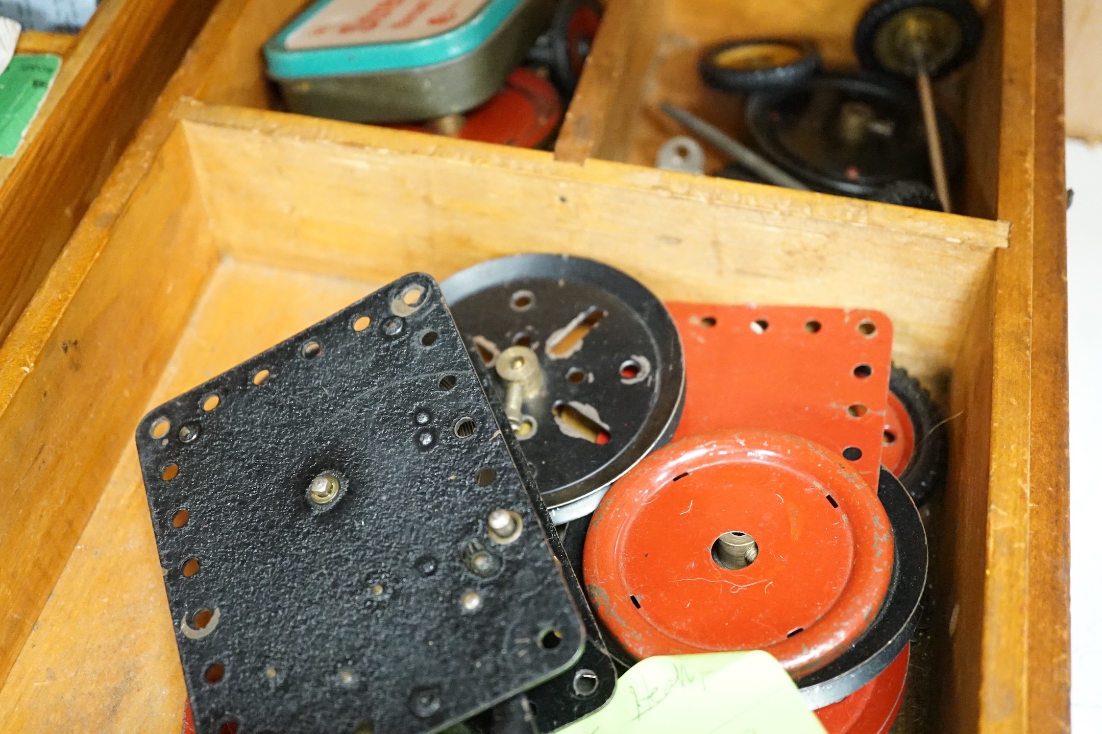 A wooden boxed meccano set and two boxed E20R electric motors